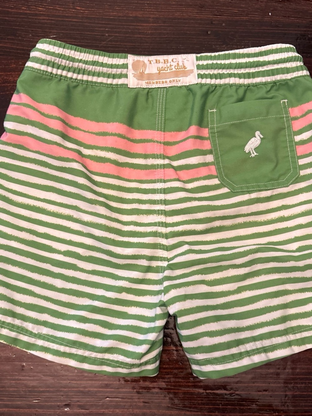 The Beaufort Bonnet Company Green and Pink Striped Kids Swim Trunks